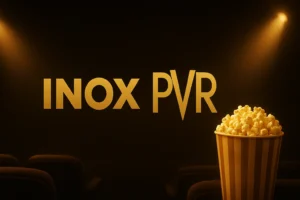 Luxurious INOX PVR cinema banner with golden lighting, popcorn bucket, and theater seats.
