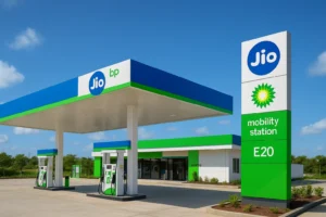 Jio-bp petrol pump mobility station in India featuring modern fuel dispensers, EV charging area, and clean green branding under a blue sky.